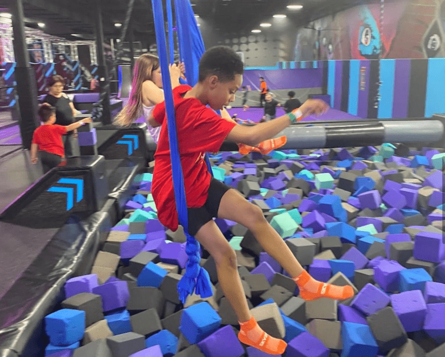 Students Playing on Aerial Ropes